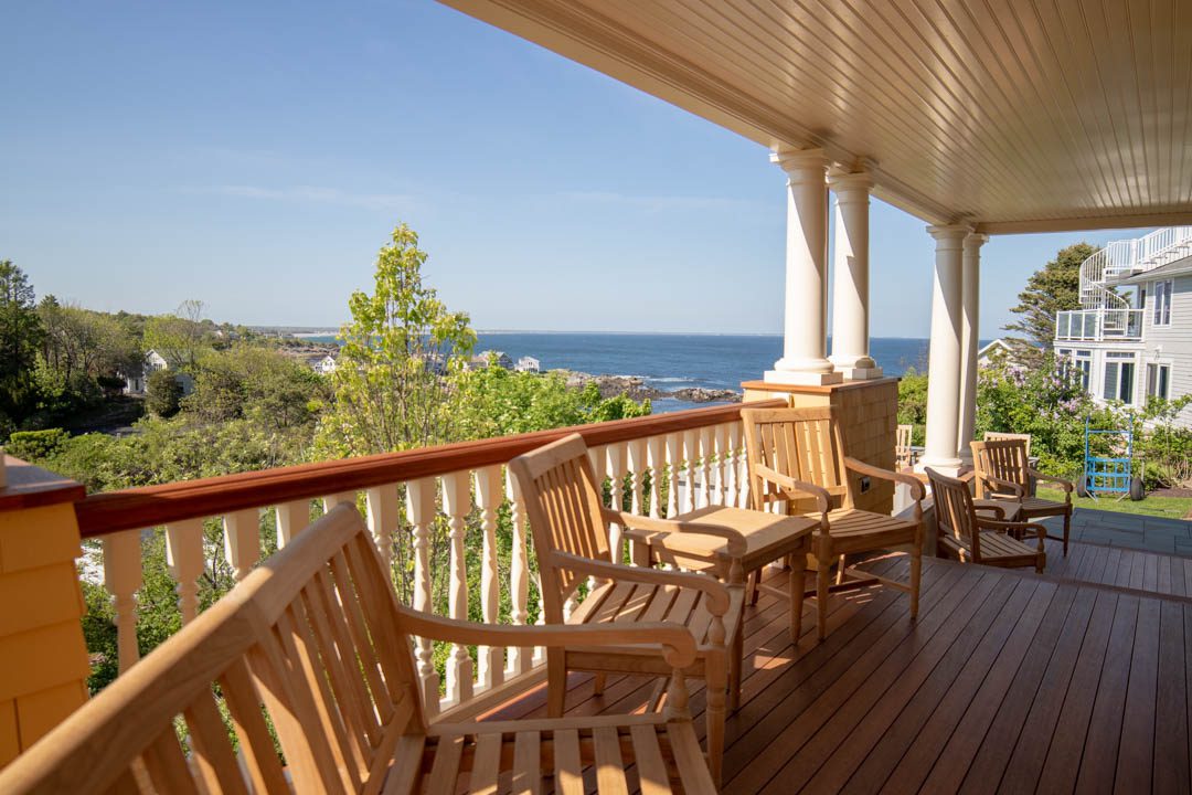Ogunquit, Maine oceanfront custom home by Don Madore custom home design and construction. Classic New England porch with Atlantic ocean views.
