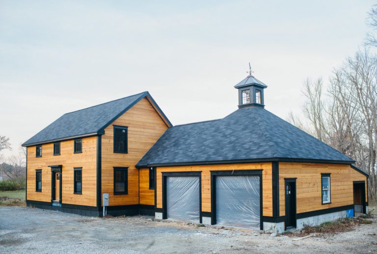 NH New England saltbox style home. New Construction project by Don Madore.