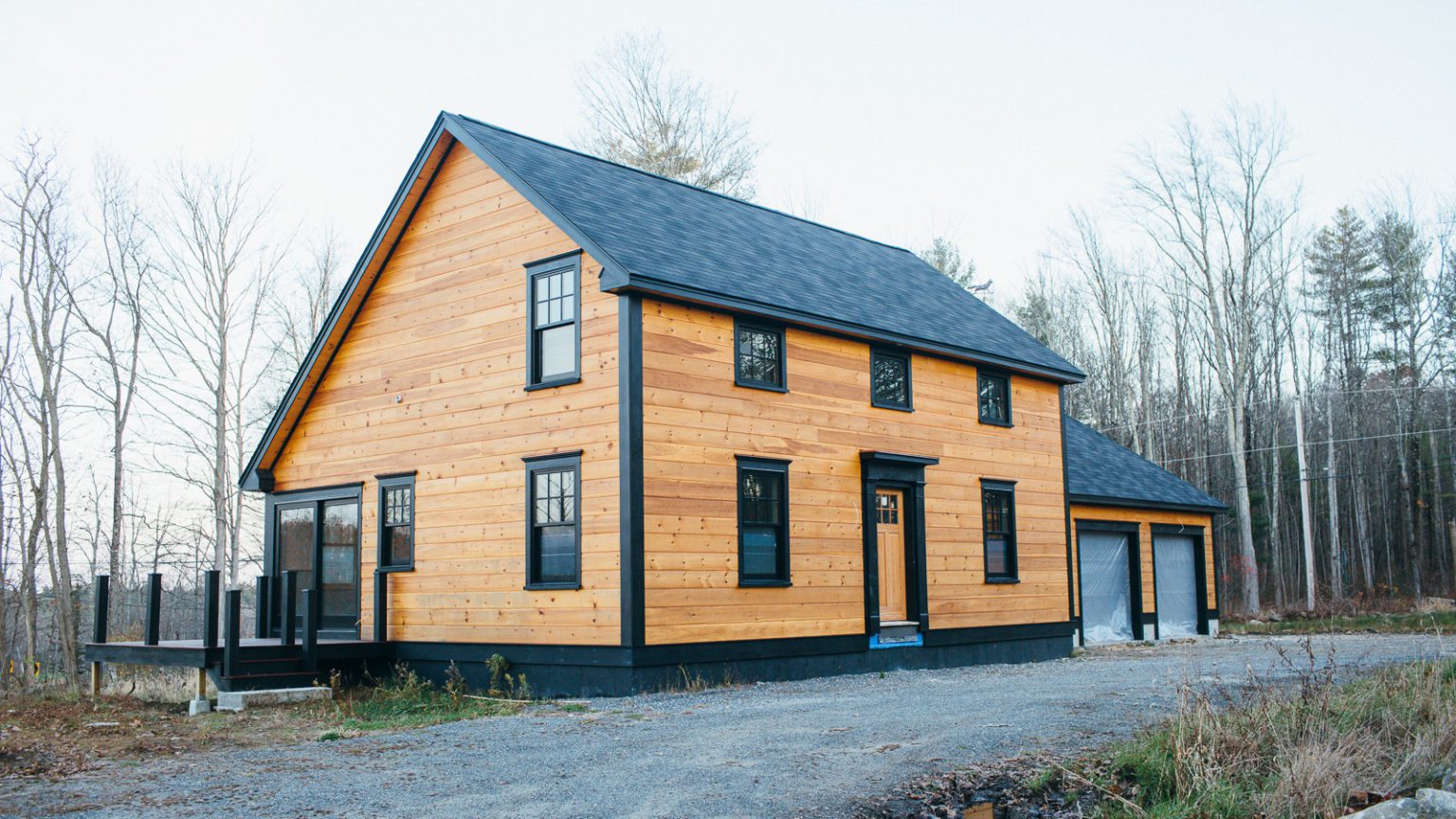 NH New England saltbox style home. New Construction project by Don Madore.